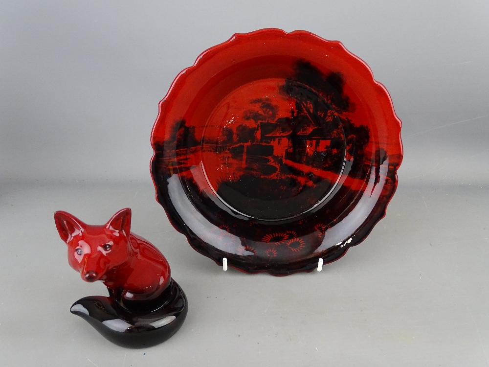 Two items of Doulton flambe including a seated fox and a shaped edge bowl no. 8206C
