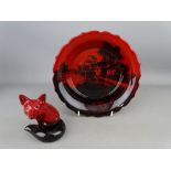 Two items of Doulton flambe including a seated fox and a shaped edge bowl no. 8206C