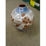 Royal Doulton bulbous vase with slipware type floral decoration, 27 cms high