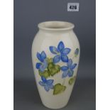 Moorcroft pottery floral decorated vase, 19 cms high