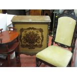 Antique style speaker cabinet with tapestry front, black and upholstered chair and a whatnot