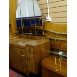 Three section mirror backed dressing chest, small wooden blanket box, large wooden headboard and a