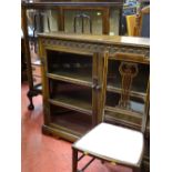 Two door glazed and carved display cabinet, a polished wood cabinet with ball and claw feet and a
