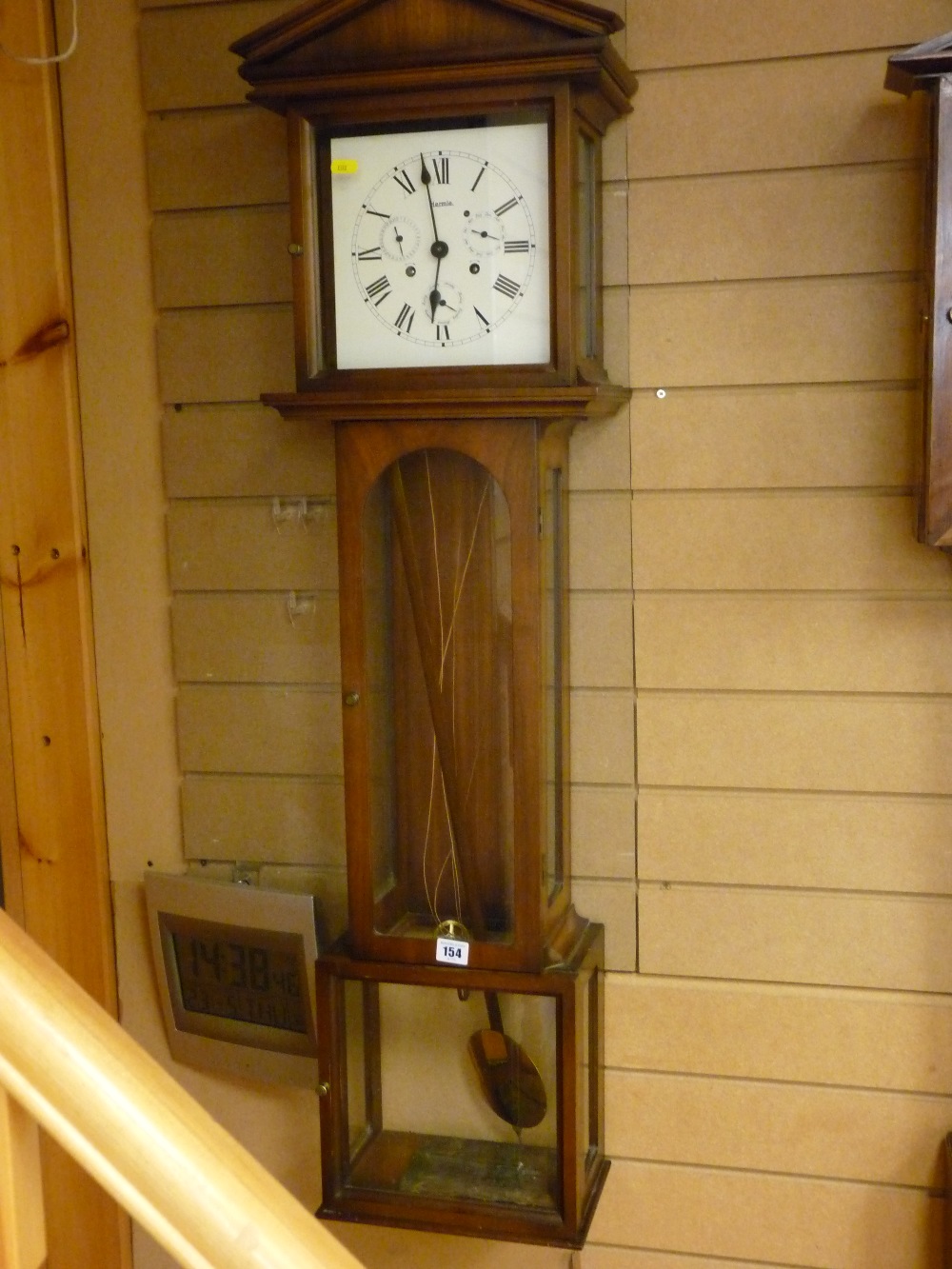 Reproduction wall clock by Hearmle, 126 cms high overall, with weights