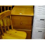 Two drawer pine filing cabinet, pair of pine spindleback kitchen chairs and a white finished three