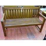 Heavy hard wood three seater garden bench