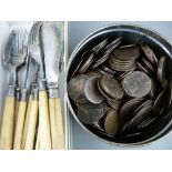 Tin of bronze coinage and a quantity of bone handled flatware