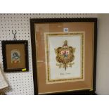 Framed commemorative silk of Victoria, 20 x 16 cms and a framed family crest