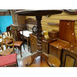 Circular top antique barley-twist tripod table