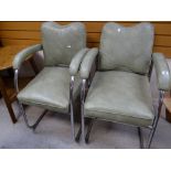 A pair of mid-century retro chrome supported upholstered armchairs with adjustable backs