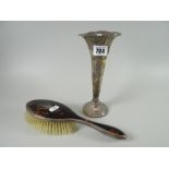 A silver and tortoiseshell backed vintage hairbrush and a silver trumpet vase (loaded) Please