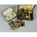 A parcel of gentleman's studs and cuff links in three containers