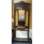 A vintage barley-twist and mirror back hall wash stand, 69cms wide