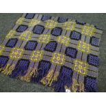 A purple and mustard geometric Welsh blanket