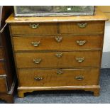 An excellent antique oak of three long and two short drawers, 83cms wide