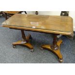 A twin-pedestal rosewood Long John-type coffee table, 90cms long
