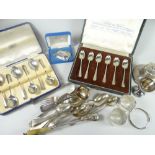 A parcel of mixed silver including two cased sets of silver spoons, various flatware, inkwell, a