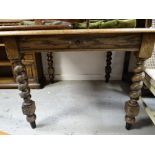 A vintage barley-twist oak winding extending dining table, 104cms wide