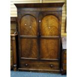 An antique mahogany two-door wardrobe with base drawer, 196 x 120cms