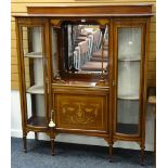 A good Edwardian mahogany inlaid display cabinet having flanking curved full-length glass cabinets