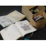 A tub of loose and stamps in albums together with first day covers and presentation packs
