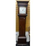 A late eighteenth / early nineteenth century oak encased painted dial longcase clock inscribed Bunse