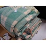 Three mainly green and cream check Welsh woollen blankets