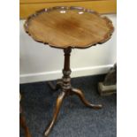 A good antique tripod table with galleried shaped circular top