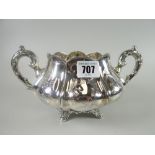 A heavy quality floral-engraved and fluted twin-handled silver sucrier, raised over four scroll