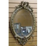 A good antique gilt framed mirror with moulded decoration, cherubic and laurel finial and three-