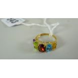 RING being a 9-carat yellow gold multi-colour gem-set ring, 2.7 grams approximately in box.