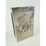 MATCHBOX HOLDER in white metal repousse depicting figure sat in farming landscape, stamped to