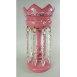 AN ANTIQUE PINK AND SATIN GLASS DROP-LUSTRE VASE having a circular base and coronet top, 33cms high