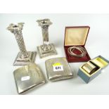 A PARCEL OF SILVER comprising pair of architectural square based candlestick holders, two concave