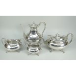 SILVER GEORGE V MATCHED SILVER FOUR-PIECE TEA & COFFEE SET comprising coffee pot, teapot, cream