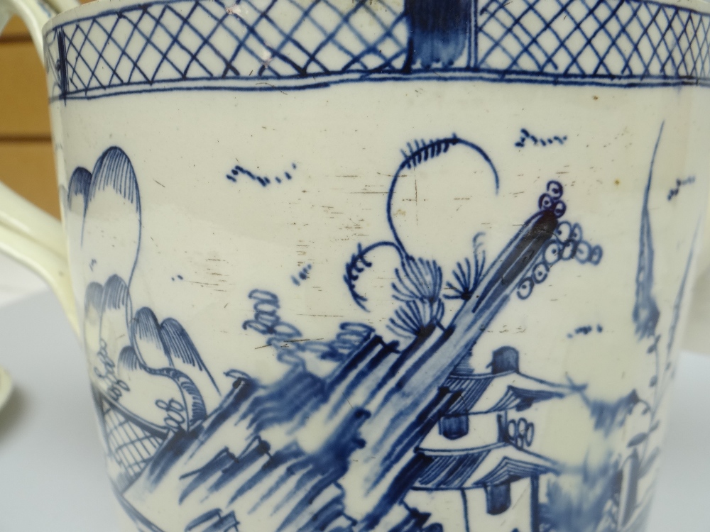 AN EIGHTEENTH CENTURY CREAMWARE OVERSIZE TEAPOT decorated with underglazed blue landscape decoration - Image 4 of 12