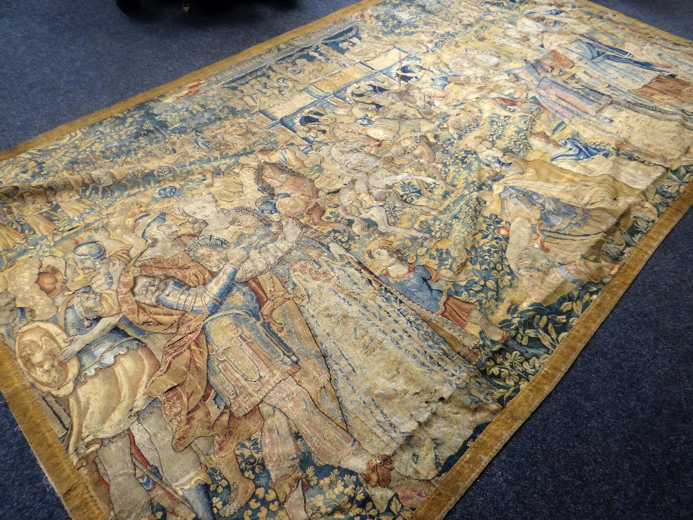 A 16th / 17th CENTURY VERDURE HISTORICAL BANQUETING-ROOM TAPESTRY of large proportions and depicting