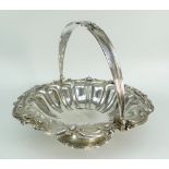 WILLIAM IV SILVER FLUTED SWING HANDLED PEDESTAL BOWL having scroll, foliate and floral border.