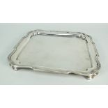 GEORGE V SILVER SQUARE SALVER OR TRAY RAISED ON FOUR CORNER FEET. London 1935, Mappin & Webb, 21 x