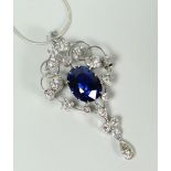 WHITE METAL DIAMOND AND SAPPHIRE HEART SHAPED PENDANT ON SILVER CHAIN. 10.4 grams approximately.