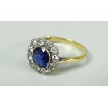 18CT YELLOW GOLD DIAMOND AND SAPPHIRE FLOWER HEAD OR CLUSTER RING. 3.1 grams approximately.