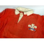 A 1953-1957 WALES RUGBY UNION MATCH WORN JERSEY NUMBER 5, ISSUED TO GARETH GRIFFITHS With white