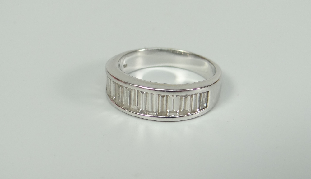 18K WHITE GOLD BAGUETTE CUT DIAMOND HALF ETERNITY RING, set with a horizontal graduated row of