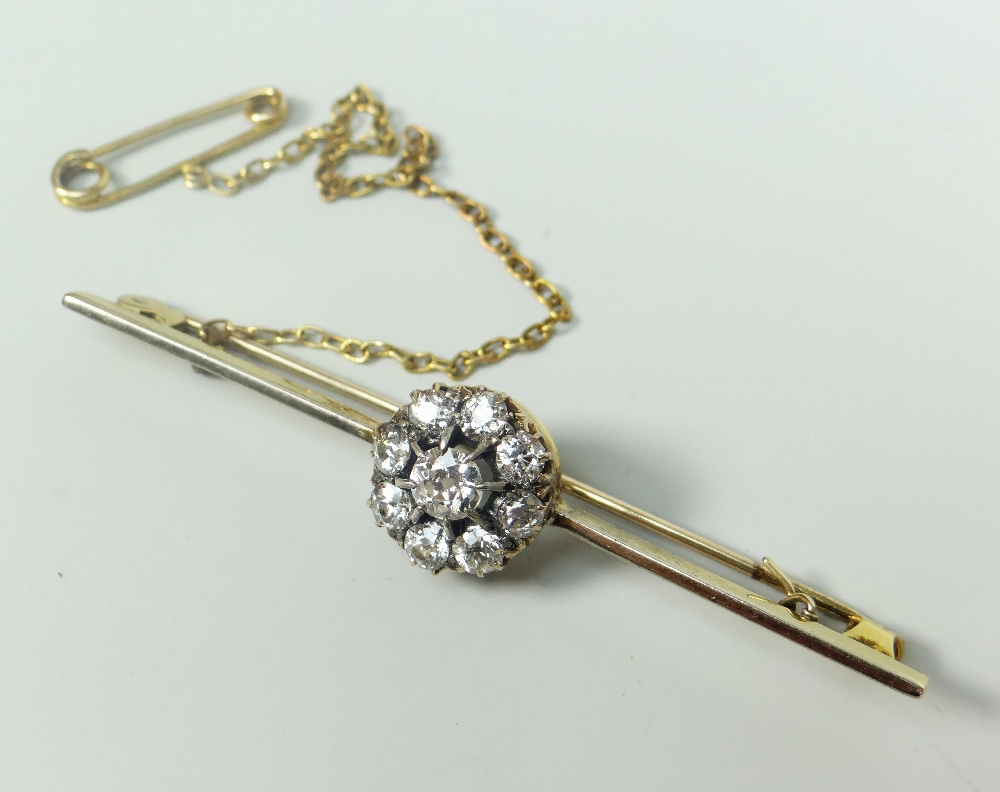 DIAMOND SEVEN STONE FLOWER HEAD OR CLUSTER BAR BROOCH set in yellow metal. Overall diamond carat - Image 2 of 2