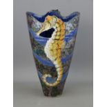 A ROGER COCKRAM PIERCED STONEWARE SEAHORSE VASE, 24 cms high with seal stamps in relief and