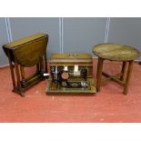 A SMALL OAK DROP LEAF GATE LEG COFFEE TABLE, a circular occasional table and a Frister & Rossman