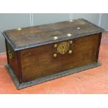 AN ANTIQUE MAHOGANY LIDDED BLANKET CHEST, the edge moulded top with large brass button decoration