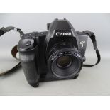 A Canon EOS3 camera with 50mm lens