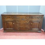 18th Century oak dresser base, peg jointed construction with 'T' arrangement of six opening