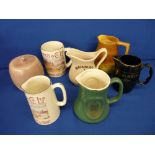 Five ale and whisky advertising water jugs, a satin glazed biscuit barrel with lid, makers include